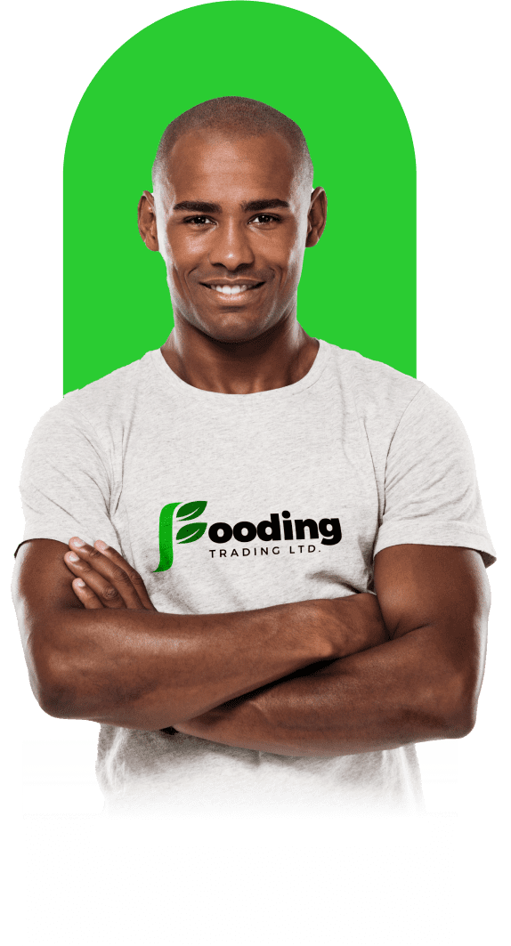 A man smiling with folded hands